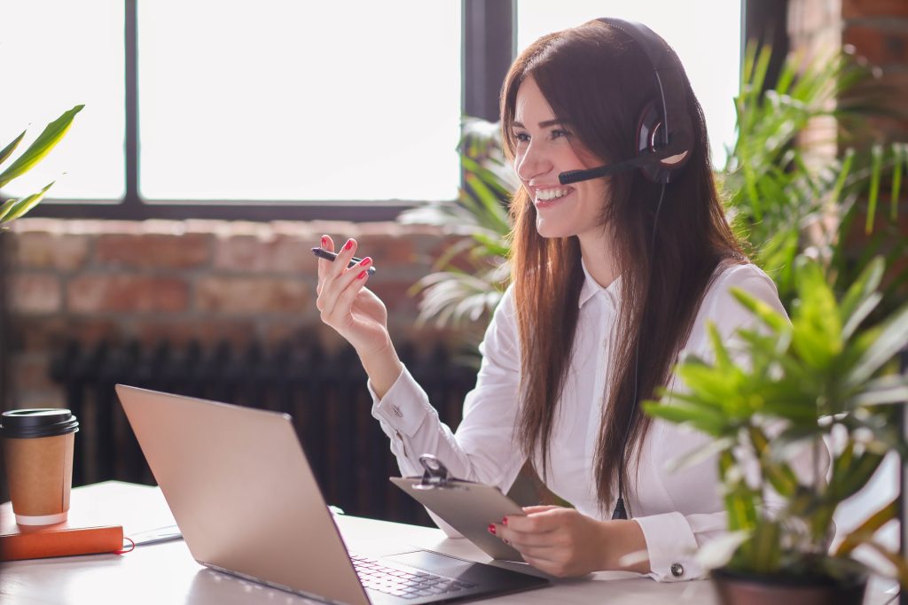 Woman working in call center as dispatcher